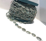 Side view of Aquamarine gemstone chain showing bezel thickness and flexible linked construction