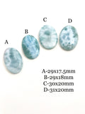 Selection of natural larimar cabochons displaying blue color variations for jewelry making stones
