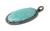 Profile view of Amazonite Silver Pendant highlighting depth of gemstone and bezel set diamond craftsmanship.