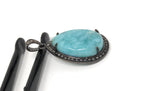 Side View of Larimar Pendant on White Background