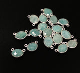 Group of Marquise Shape Amazonite connector faceted on both sides and framed in sterling silver showed on black background