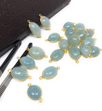 Group of Natural Aquamarine double-loop connectors