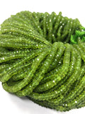 AAA Natural Peridot faceted gemstone bead strands 4–4.5mm featuring vibrant green genuine Peridot beads for professional jewelry making.