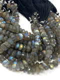 Close up of natural Labradorite beads showing blue flash