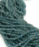 AAA natural Blue Tourmaline gemstone beads featuring faceted Indicolite rondelle beads with beautiful Paraiba-color blue-green hues for jewelry making.