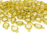 Lemon Topaz jewelry links with loops positioned at opposite ends shown on white background
