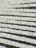 Sixteen-inch strand of milky white Rainbow Moonstone square heishi beads with subtle blue flash