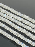 Square heishi Rainbow Moonstone  shown on black background