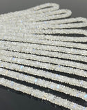 smooth square Rainbow Moonstone beads showing natural translucency and blue reflections