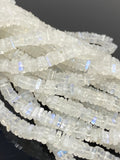 Close-up of smooth square Rainbow Moonstone beads showing natural translucency and blue reflections