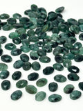 Loose emerald gemstones with freeform shapes, rose cut faceted tops and flat backs for jewelry making