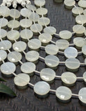 Natural white moonstone beads displayed on elegant background for premium jewelry making supplies