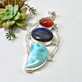 Picture of labradorite gemstone with blue flash protection crystal in designer pendant