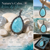 Larimar statement pendant showing ocean blue gemstone patterns and diamond details