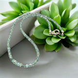 Heart and throat chakra tourmaline necklace with blue green gemstones