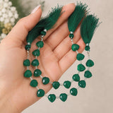 Green Onyx Heart Shape Beads shown on hand