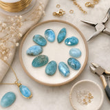 Rose-cut Larimar cabochons styled with sterling-silver jewelry-making tools