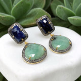 Natural emerald and blue sapphire pavé diamond earrings in black rhodium sterling silver with Victorian-inspired gemstone design.