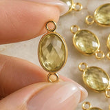 Lemon Topaz connectors measuring approximately 17 by 9 mm to 20 by 11 mm including loops