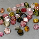 AAA natural multi-color tourmaline cut stones featuring pink, green, golden and bi-color gemstones for luxury jewelry designs.