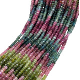 Close up of AAA Natural Watermelon Tourmaline faceted gemstone beads with beautiful pink and green natural colors on a white background.