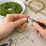 Elegant handmade jewelry being created using premium natural Peridot gemstone beads.