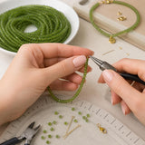 Elegant handmade jewelry being created using premium natural Peridot gemstone beads.