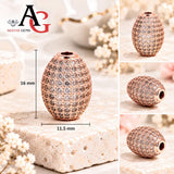 Rose Gold Color oval micro pave CZ spacer bead 16x11.5mm showing cubic zirconia detail and large stringing hole