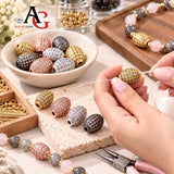 Oval micro pave CZ spacer beads in gold, rose gold, platinum and gunmetal finishes being used with jewelry making tools to create handmade jewelry