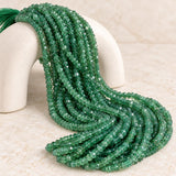 Faceted natural emerald bead strands with genuine green gemstone variations and sparkle
