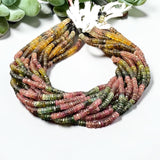 AAA natural Tourmaline Heishi facteted beads on white background