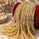 Faceted Ethiopian opal rondelle beads showing multicolor fire and natural gemstone variations